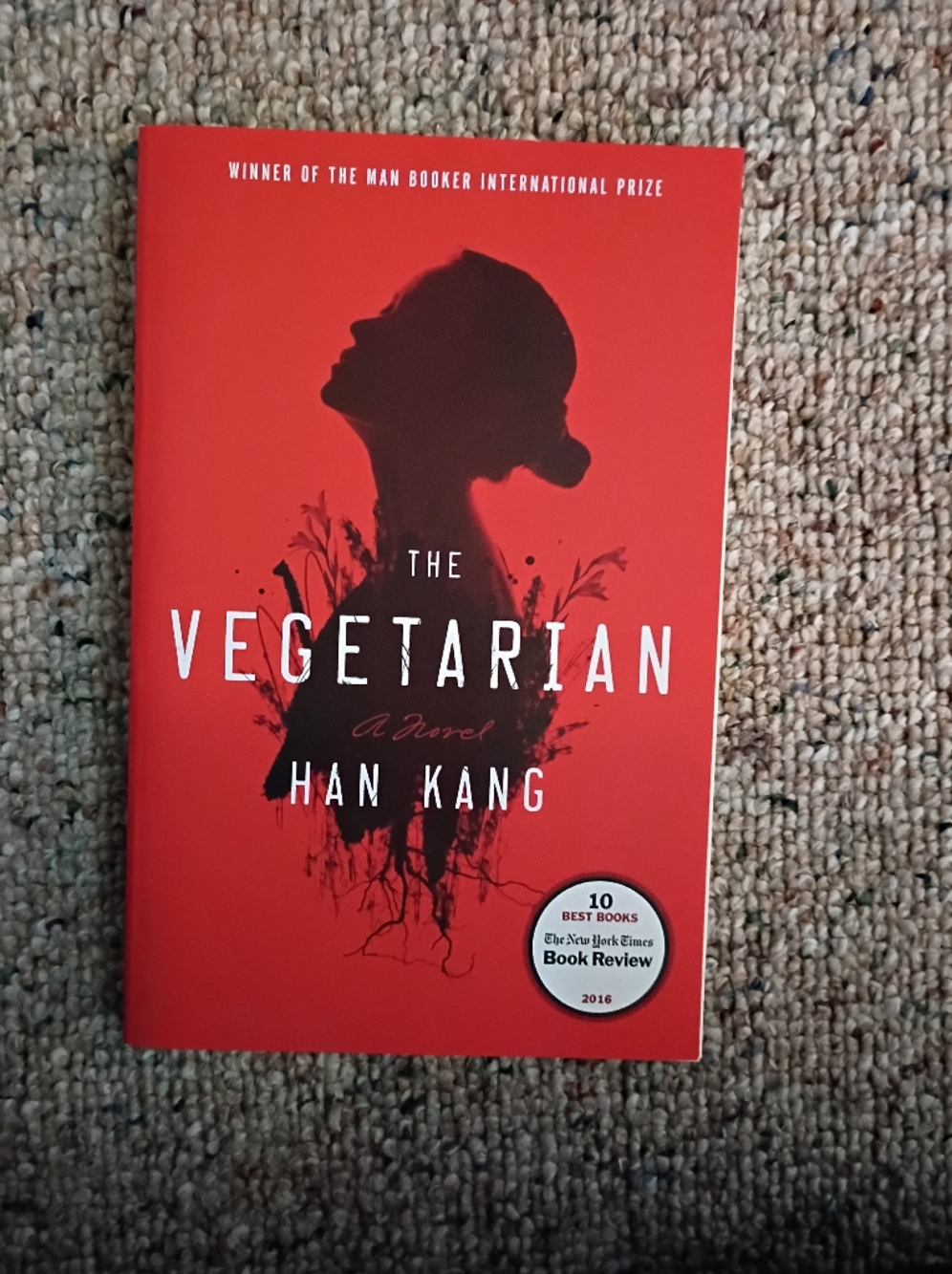 The Vegetarian by Han Kang - Red Paperback Novel